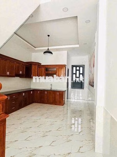 nhà 1 trệt 2 lầu Cách ngã 6 An Phú, Thuận An 1,5 km, đường 7m