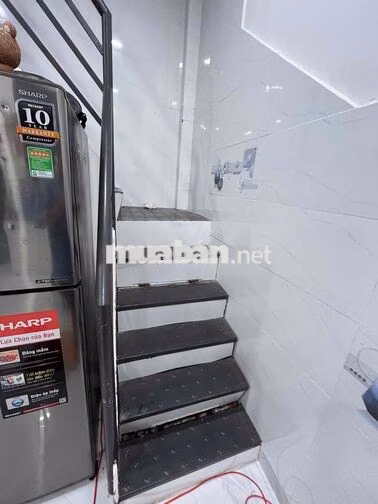nhà góc 2 mặt tiền cách hẻm xe hơi 500m