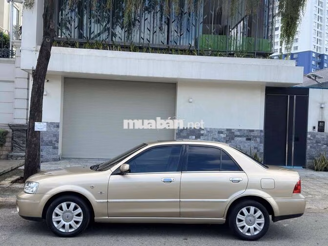 18.000 Km👉Ford Laser GHia 1.8L AT 2004 Vàng cát