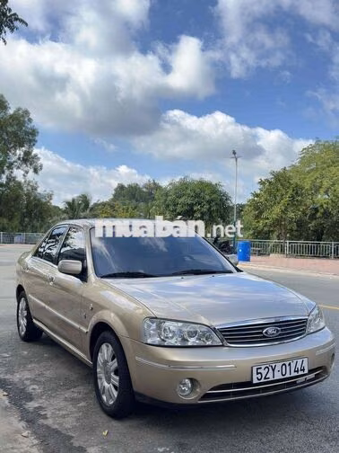 18.000 Km👉Ford Laser GHia 1.8L AT 2004 Vàng cát