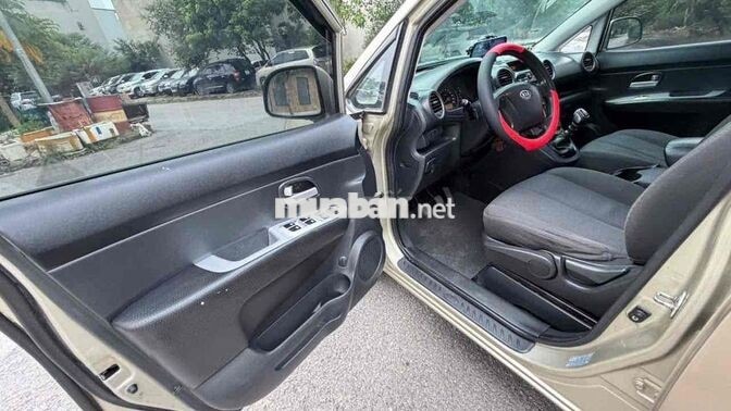 Kia Caren 2009 Số sàn Vàng cát