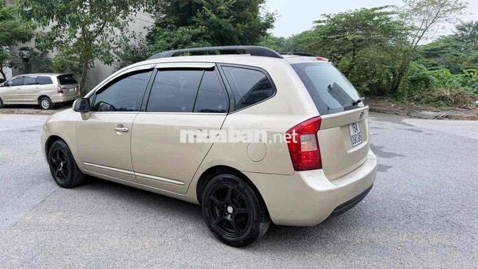 Kia Caren 2009 Số sàn Vàng cát