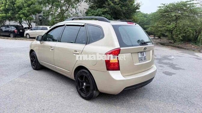 Kia Caren 2009 Số sàn Vàng cát