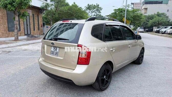 Kia Caren 2009 Số sàn Vàng cát
