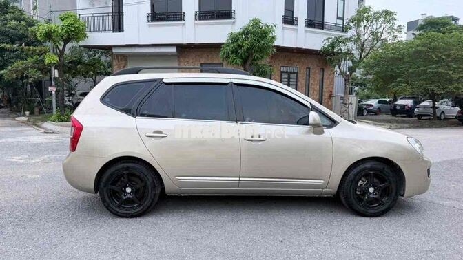 Kia Caren 2009 Số sàn Vàng cát