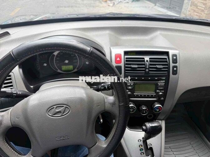 Hyundai Tucson 2009, Xám Tự động Xăng