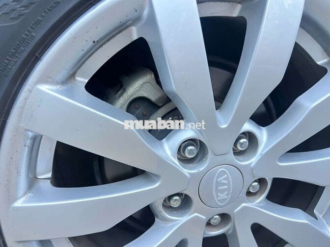 Kia Carens 2010 Số sàn Xăng 1.6 Vàng