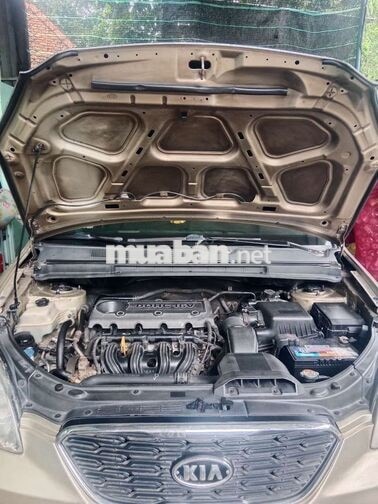Kia Caren 2013 Số sàn Vàng cát 7 chỗ
