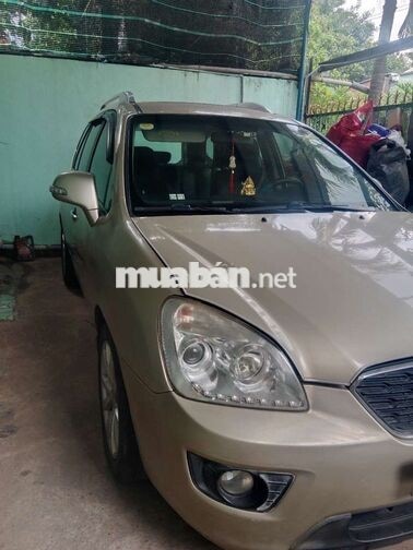 Kia Caren 2013 Số sàn Vàng cát 7 chỗ