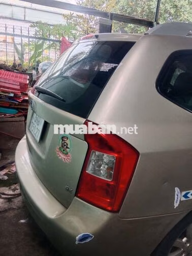 Kia Caren 2013 Số sàn Vàng cát 7 chỗ