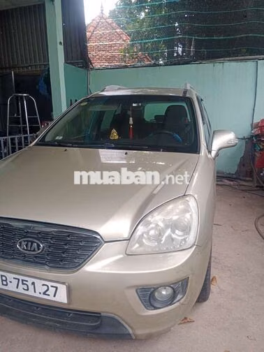 Kia Caren 2013 Số sàn Vàng cát 7 chỗ