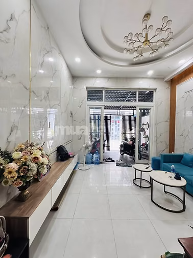 Nhà mặt tiền Tân chánh hiệp 18 4 tầng DT 62 m2