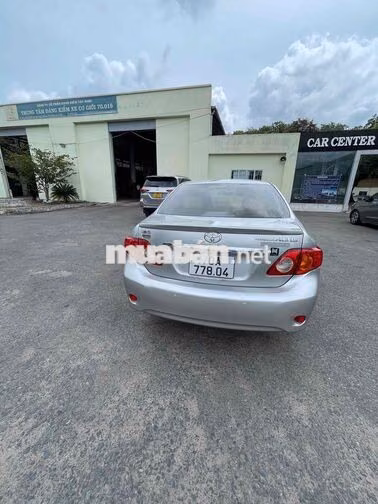 Toyota Corolla Altis Bạc 5 chỗ giao lưu xe tải