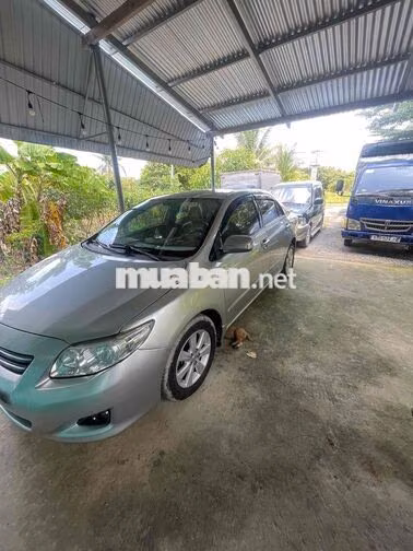 Toyota Corolla Altis Bạc 5 chỗ giao lưu xe tải