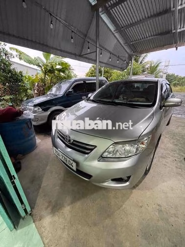 Toyota Corolla Altis Bạc 5 chỗ giao lưu xe tải