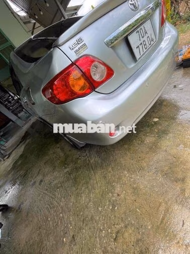 Toyota Corolla Altis Bạc 5 chỗ giao lưu xe tải