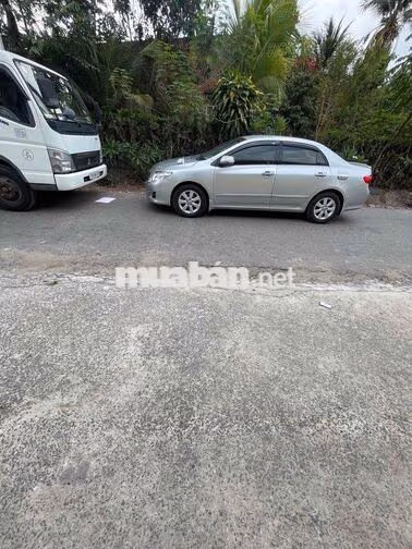 Toyota Corolla Altis Bạc 5 chỗ giao lưu xe tải