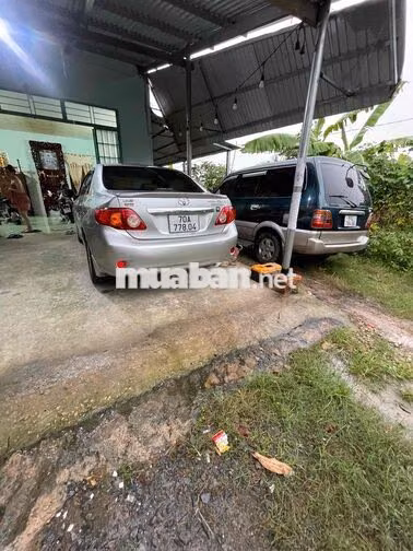 Toyota Corolla Altis Bạc 5 chỗ giao lưu xe tải