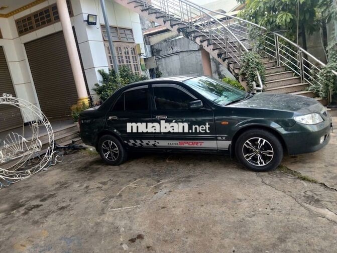 CẦN BÁN XE MAZDA 323 CŨ ĐỜI 2002