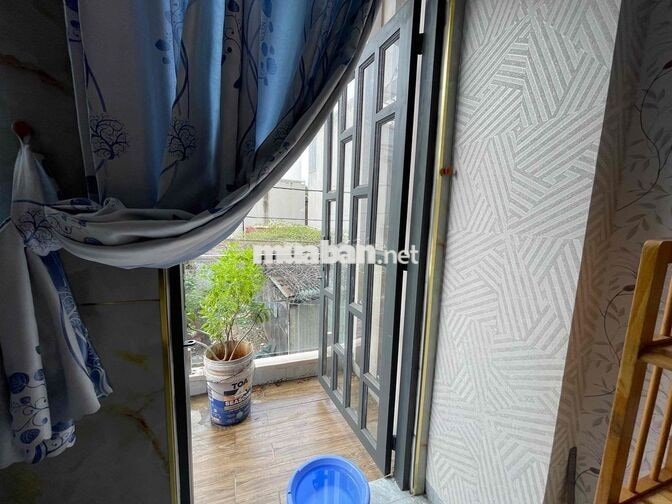 Nhà 1 trệt 1 lầu, 2 mặt tiền, ô tô 7 chỗ đậu trong nhà Bình Chiểu , Th