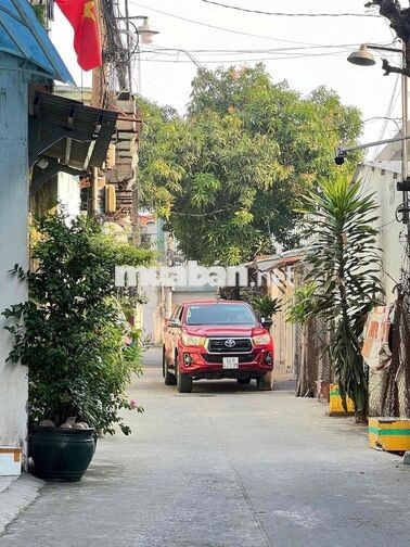 NHÀ 2 MẶT TIỀN TRƯỚC SAU ÔTÔ NGỦ NGON TRONG NHÀ GẦN SÂN BAY