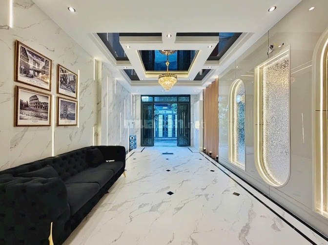 Xe hơi để trong Nhà 5 lầu tuyệt đẹp Cao cấp hẻm sát Mặt tiền Phạm Văn 