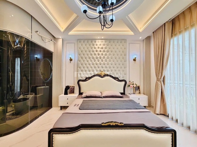 Xe hơi để trong Nhà 5 lầu tuyệt đẹp Cao cấp hẻm sát Mặt tiền Phạm Văn 