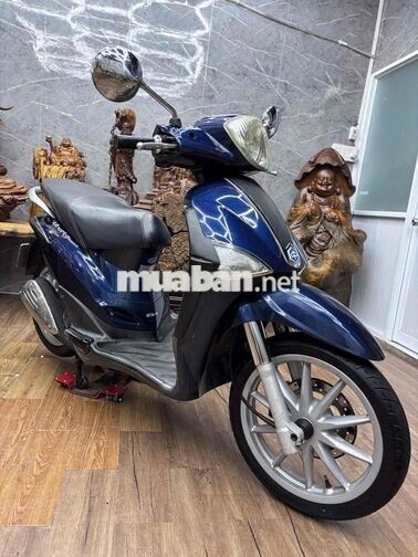 Piaggio Liberty dàn áo liền lạc, máy êm ru