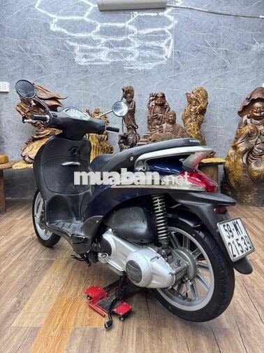 Piaggio Liberty dàn áo liền lạc, máy êm ru