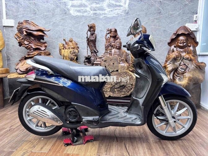 Piaggio Liberty dàn áo liền lạc, máy êm ru