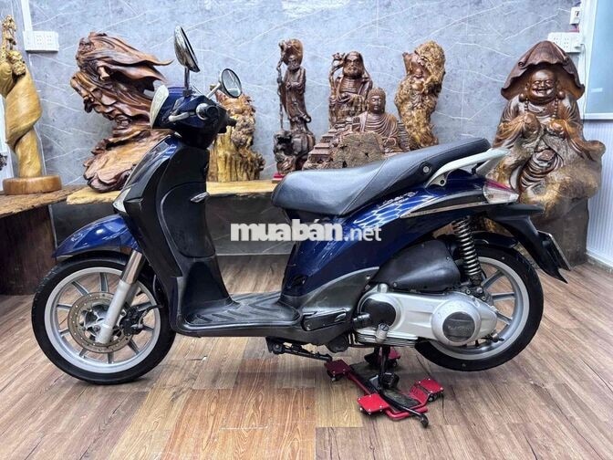 Piaggio Liberty dàn áo liền lạc, máy êm ru