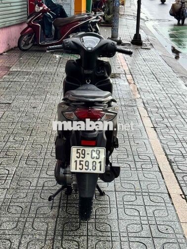 Honda Vision 2025 bản cá tính Vàng cát mâm đồng