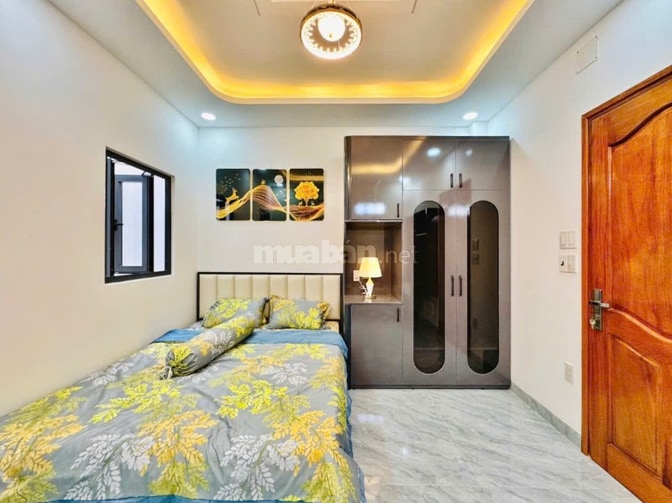 Nhà thang máy 4x15 1 lửng 3 lầu Quang Trung ngay kenh tham lương