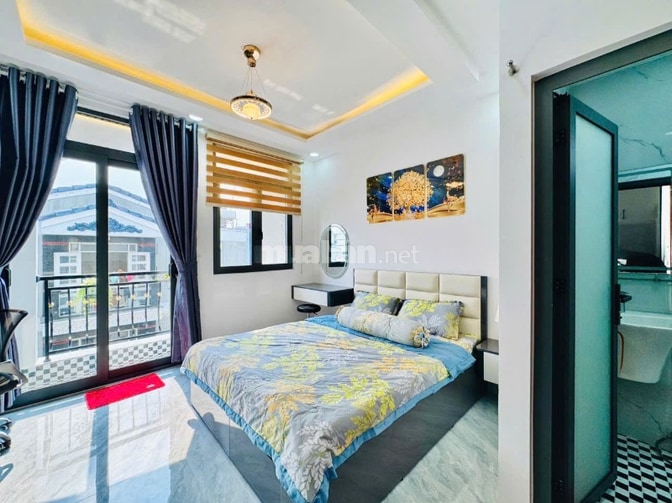 Nhà thang máy 4x15 1 lửng 3 lầu Quang Trung ngay kenh tham lương