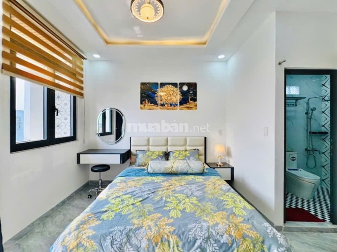 Nhà thang máy 4x15 1 lửng 3 lầu Quang Trung ngay kenh tham lương