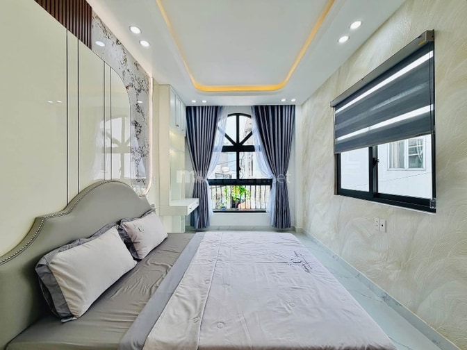 Xe hơi để trong Nhà 3 lầu tuyệt đẹp Cao cấp hẻm Phan Huy Ích, P12, Q.G