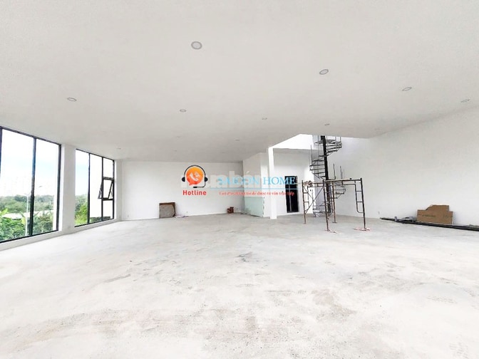 CHO THUÊ TÒA NHÀ GÓC 2 MẶT TIỀN SÀN TRỐNG SUỐT TRỤC LƯƠNG ĐỊNH