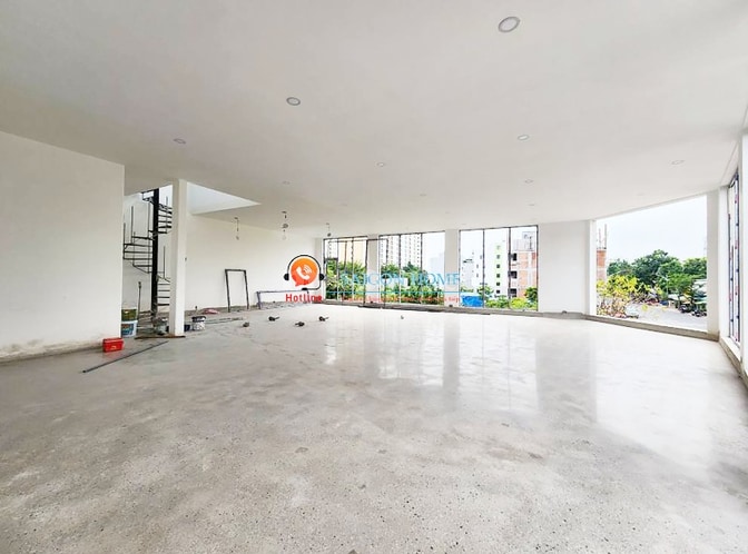CHO THUÊ TÒA NHÀ GÓC 2 MẶT TIỀN SÀN TRỐNG SUỐT TRỤC LƯƠNG ĐỊNH