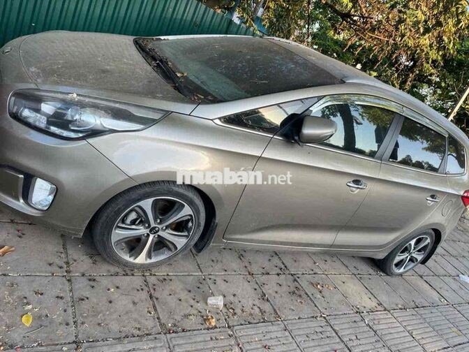 Kia Rondo 2015 GAT 2.0 AT Vàng cát