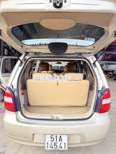 Nissan Livina 2011 Số sàn Vàng 7 chổ