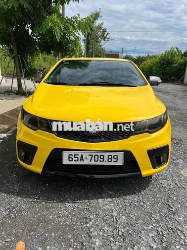 Kia Koup 2010 Vàng 2 cửa