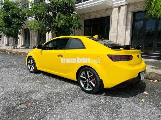 Kia Koup 2010 Vàng 2 cửa