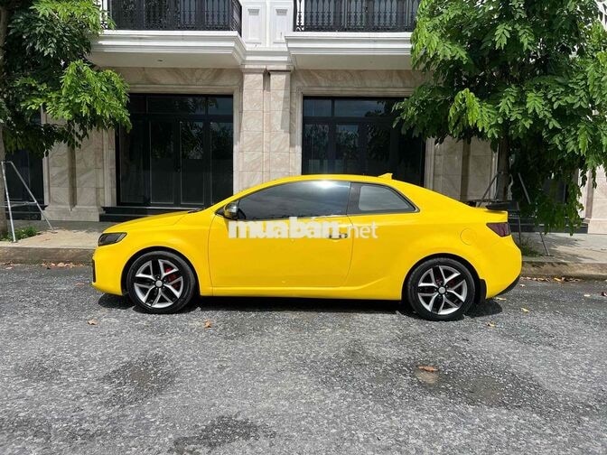 Kia Koup 2010 Vàng 2 cửa