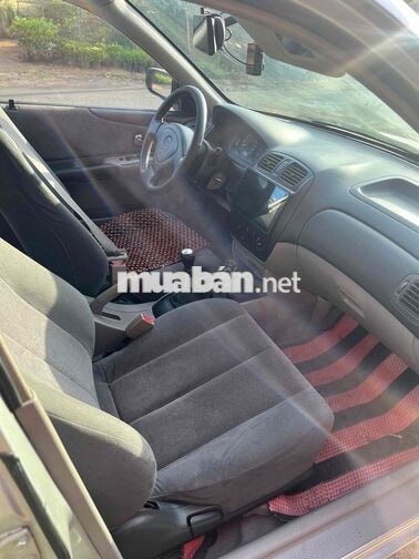 Mazda 323 2002 Bạc