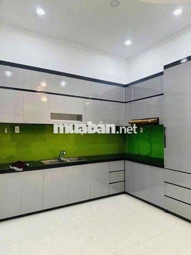 NHÀ MẶT TIỀN RỘNG ( SÂN ĐẬU 2 XE HƠI ) TRỆT 2 LẦU 4PN 4WC. MÁY LẠNH