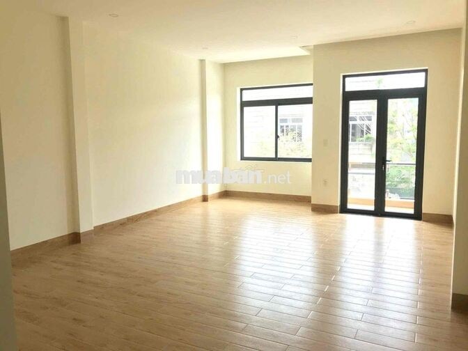 nhà 1 trệt 2 lầu gần bên xe TÂN ĐÔNG HIỆP,DĨ AN, đường 12m đậu ô tô ok