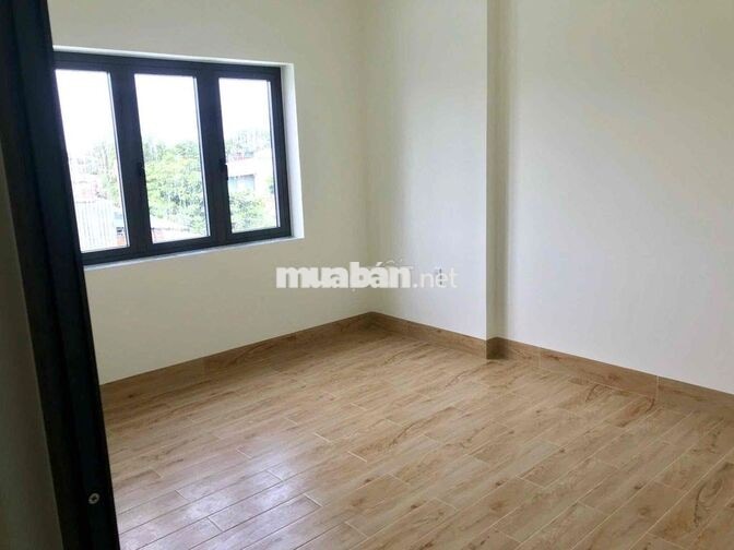 nhà 1 trệt 2 lầu gần bên xe TÂN ĐÔNG HIỆP,DĨ AN, đường 12m đậu ô tô ok