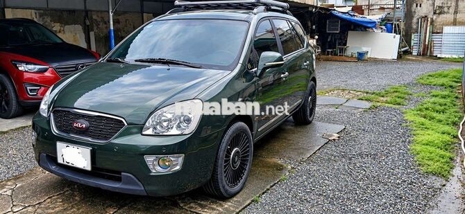 Kia Carens 2011 2.0 Số sàn Xanh rêu