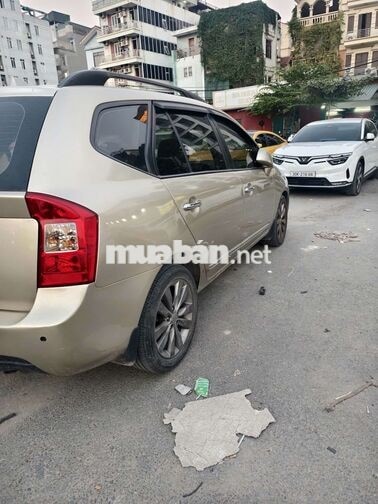 Kia Caren 2009 2.0 AT máy xăng Vàng cát