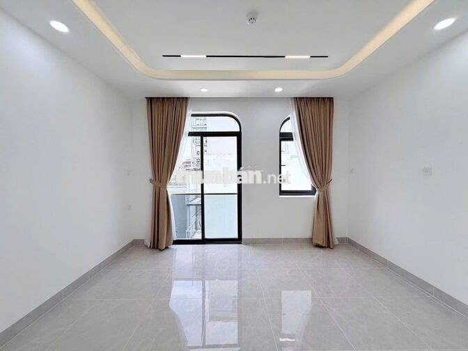 NHÀ MỚI CÓ THANG MÁY - 19B Lam Sơn, P.7, Phú Nhuận- 6 Tầng, DTSD 400m2